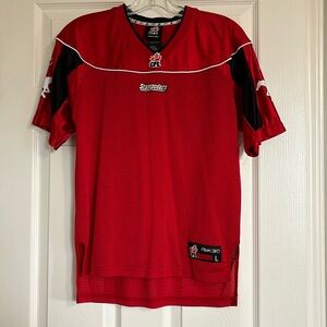 Authentic CFL Calgary Stampeders Youth Jersey size Large.
